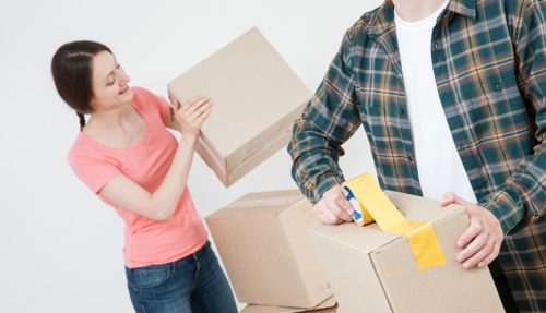 Careful box preparation and wrapping during packing services in Woodgreen