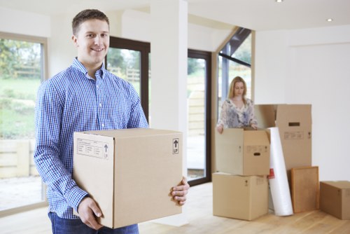 Students using storage space in Woodgreen for boxes and bedding