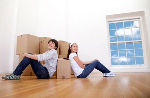 Organized storage boxes and furniture in a Woodgreen facility